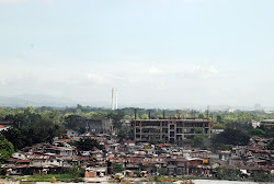 quezon slums background cbd urban informal qc settlements government