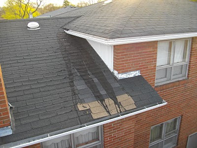 Improper Gutter Causes Roof Damage