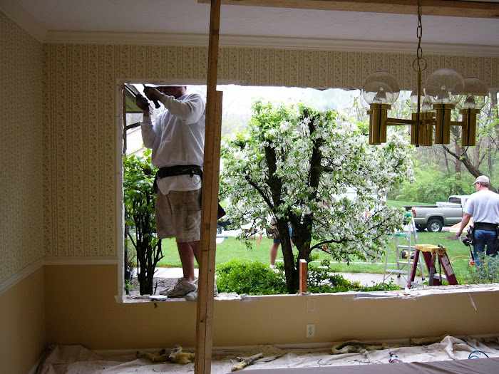 "During" installation of a huge Bow Window.