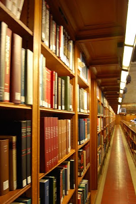 aisle of library showing books