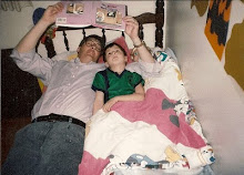 Reading with his daddy.