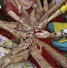 images Multan, Pakistan: Muslim girls show their henna decorated