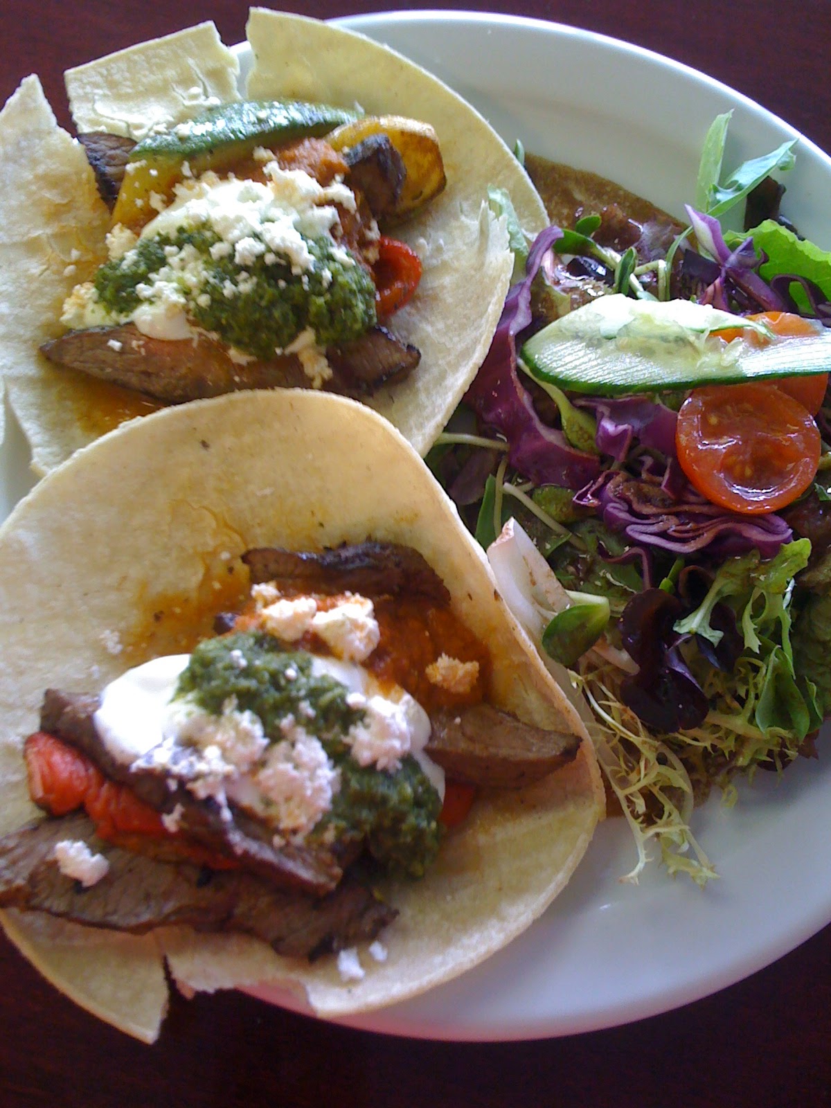 i heart Devour food steak fajitas with zucchini, peppers, ranchera sauce, salsa verde & sour cream