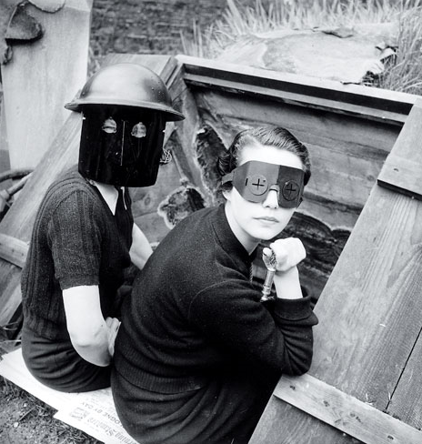 [lee-miller-women+with+masks.png]
