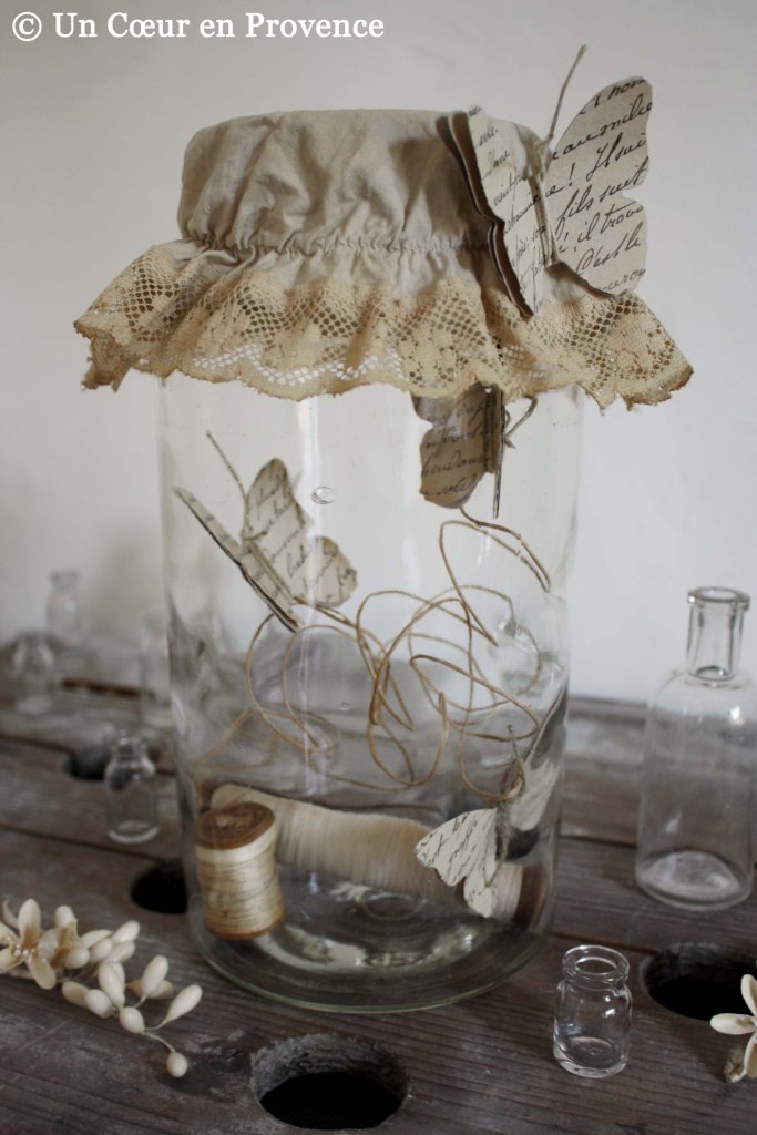 Jar and butterfly made with paper