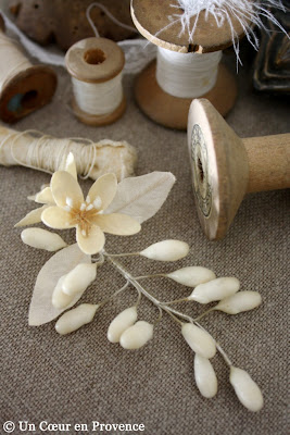 Small flowers of wax and fabric Communion