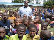 RWANDA: Lama Mugabo with Kazo elementary Students