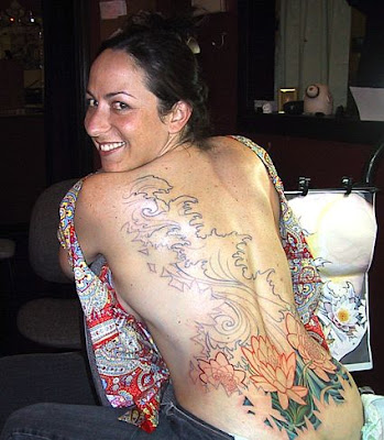 girls tattoos on back. Cute Girl and Flower Tattoo