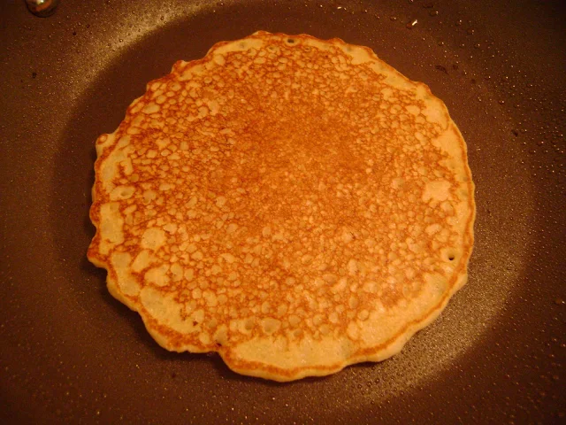 Pancake flipped in hot pan