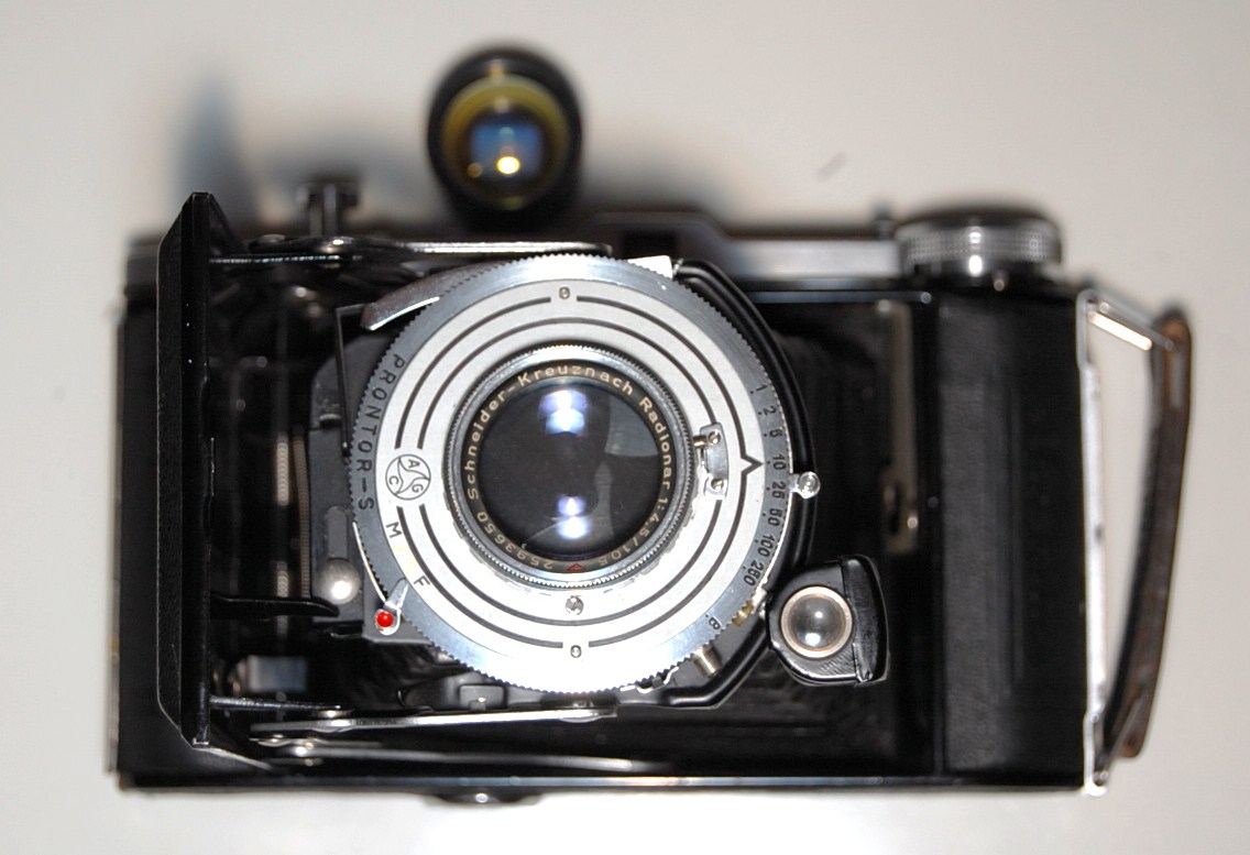 The earlier lens I showed with the Compur shutter wouldn't do because it  doesn't have a focus. It's a great lens (see examples with flash, a  negative thrown ...