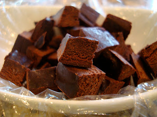 Diced up Raw Vegan Coconut Oil Chocolate in dish