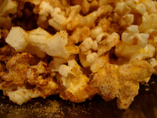 Close up of Maca Powder Sprinkled over popcorn