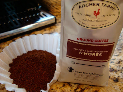 Bag of S'mores Coffee with coffee grounds in filter