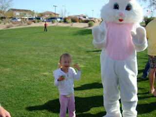 Young girl dancing with Easter Bunny