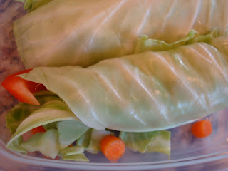 Up close of Cabbage Wraps in clear container