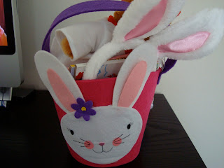 Easter Basket with bunny on front fully of gifts