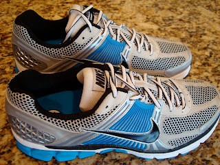 Blue and silver Nike Running Shoes