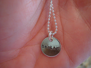 Up close of necklace with the name Skylar