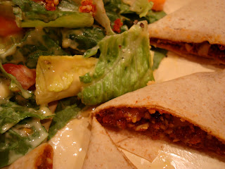 Quesadilla Wedges Plated Up with a Salad close up