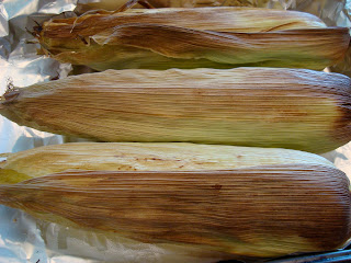 Corn after being roasted in foil lined pan