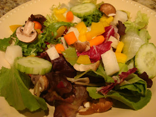 Mixed vegetable salad in round white bowl