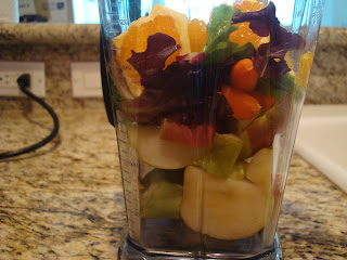 Mixture off various fruits and vegetables with agave in blender