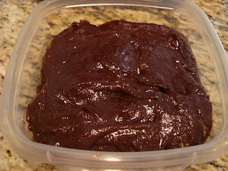 Raw vegan brownies in clear container