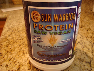 Sun Warrior Chocolate Brown Rice Protein Powder in container
