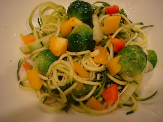 Zucchini noodles with vegetables in bowl