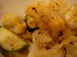 Cauliflower and zucchini topped with nutritional yeast