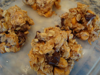 Close up of Maple Nut Chocolate Oat Clusters in clear container