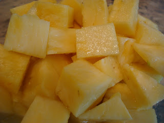 Diced pineapple in clear container