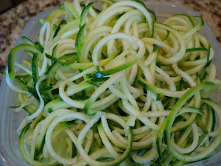 Spiralized zucchini in clear container
