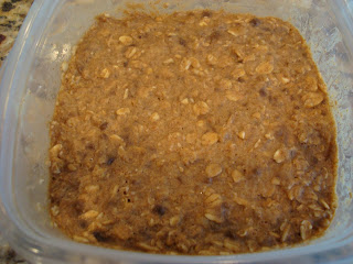 Mixed up Breakfast Cookie ingredients in clear container after refrigeration
