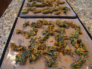 Finished Cheezy Kale Chips on dehydrator trays