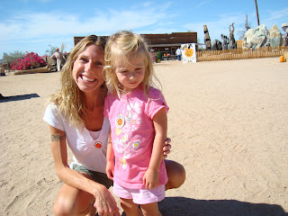 Woman and young girl at pumpkin patch