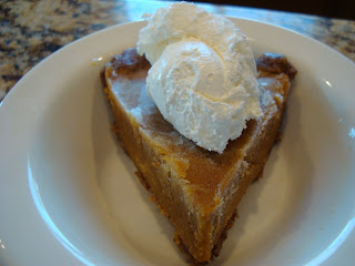 Slice of No-Bake Vegan Pumpkin Pie topped with whipped cream