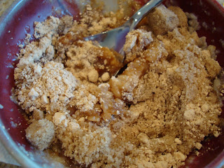 Ingredients in bowl to make Butterfinger Oats with spoon