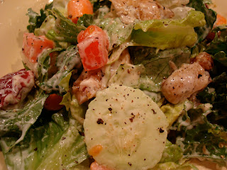 Close up of Green salad with turnkey and vegetables with ranch dressing