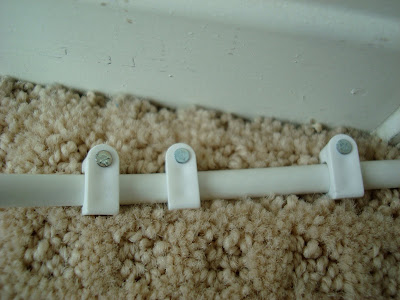 Nails with pieces holding wire into place - 7