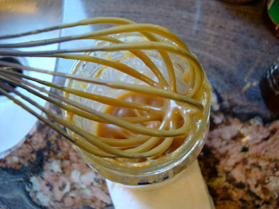 Whisk in jar with peanut sauce