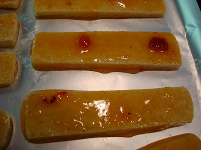 Close up of Mango Ginger Maple Tofu on foil lined baking sheet