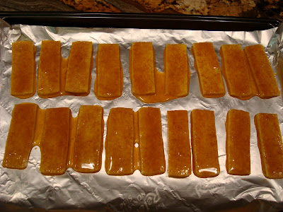Marinated tofu in single layer on foil lined baking sheet