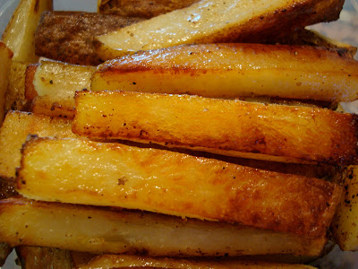 Close up of stacked Coconut and Olive Oil Roasted Potato Sticks