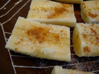 Close up of Warm Cinnamon Sugar Bananas on plate