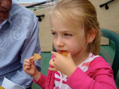 Young girl eating chips