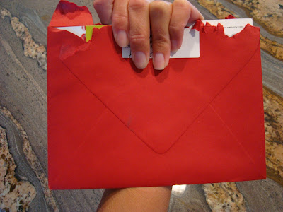 Hand holding opened Red Envelope