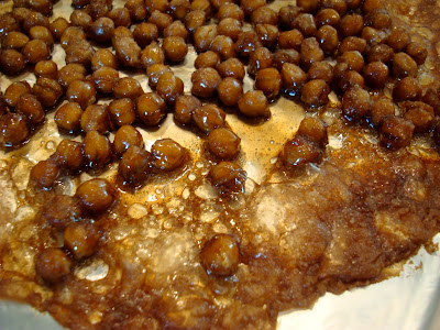 Close up of Carmelized Cinnamon Sugar Roasted Chickpea Peanuts after 20 minutes of baking