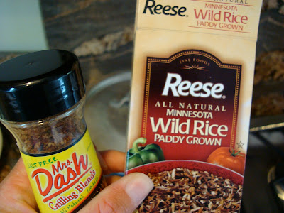 Hand holding package of Wild Rice and Mrs. Dash