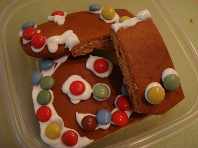Leftover gingerbread man cut up into container